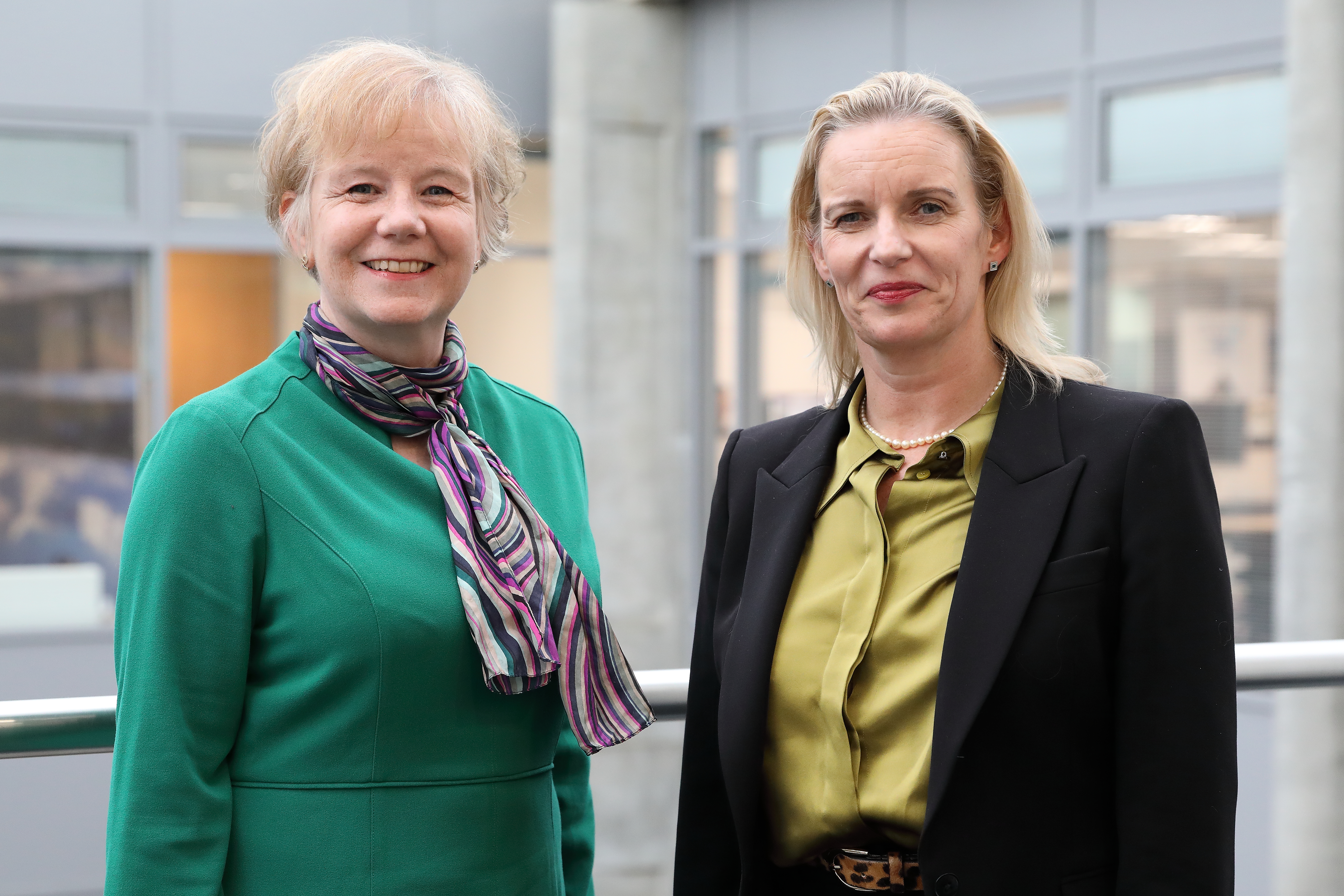 Elaine Lorimer, left, and Johanna Boyd, right, standing side by side and smiling at the camera.